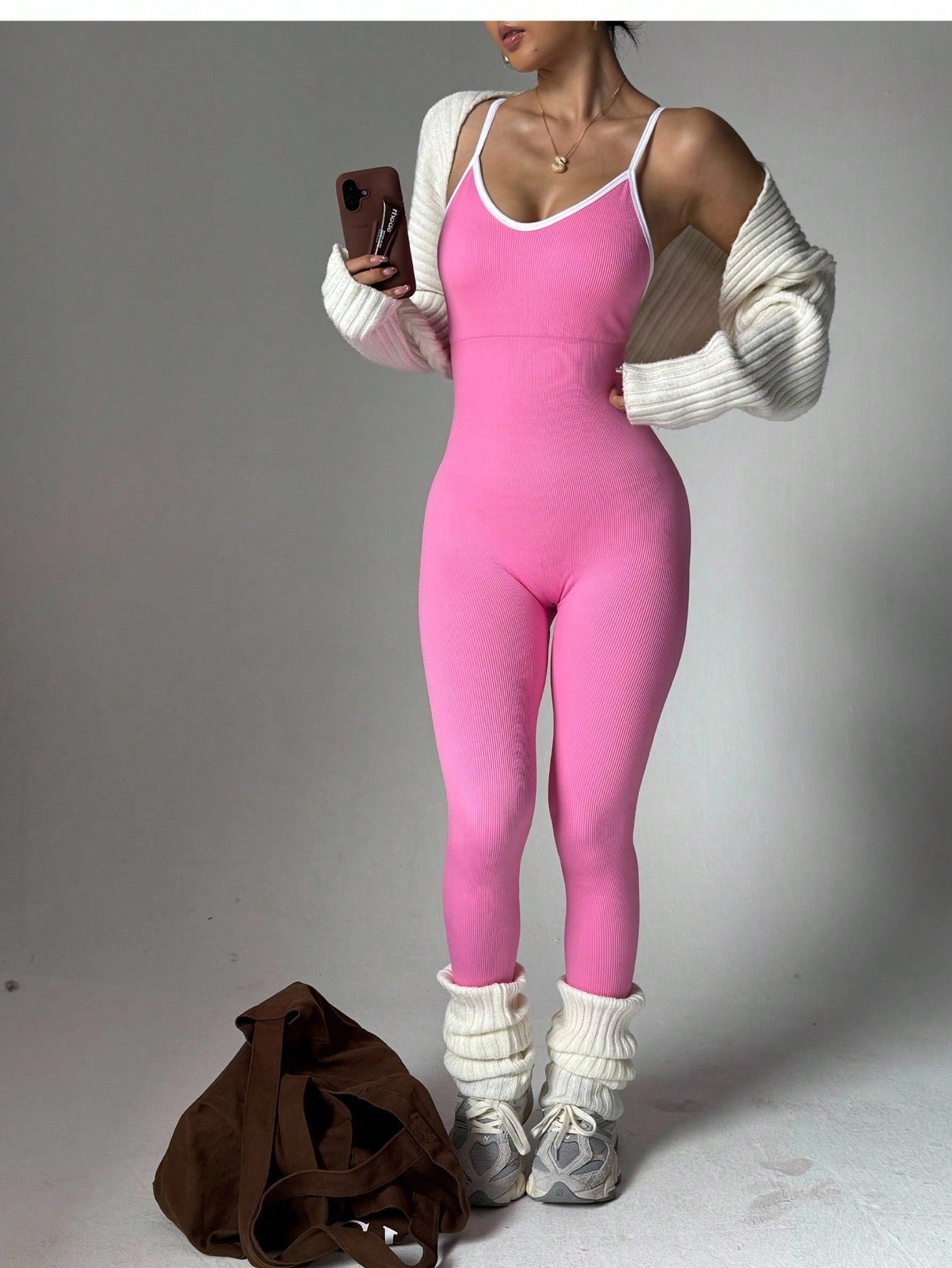 Elevate Your Yoga Game with the Slayoga Women's Ribbed Backless Jumpsuit in Pink