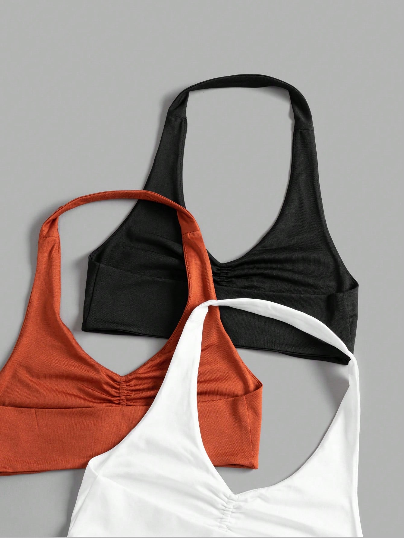 Elevate Your Workout with the Studio Sport 3-Piece Letter Graphic Backless Sports Tee Set