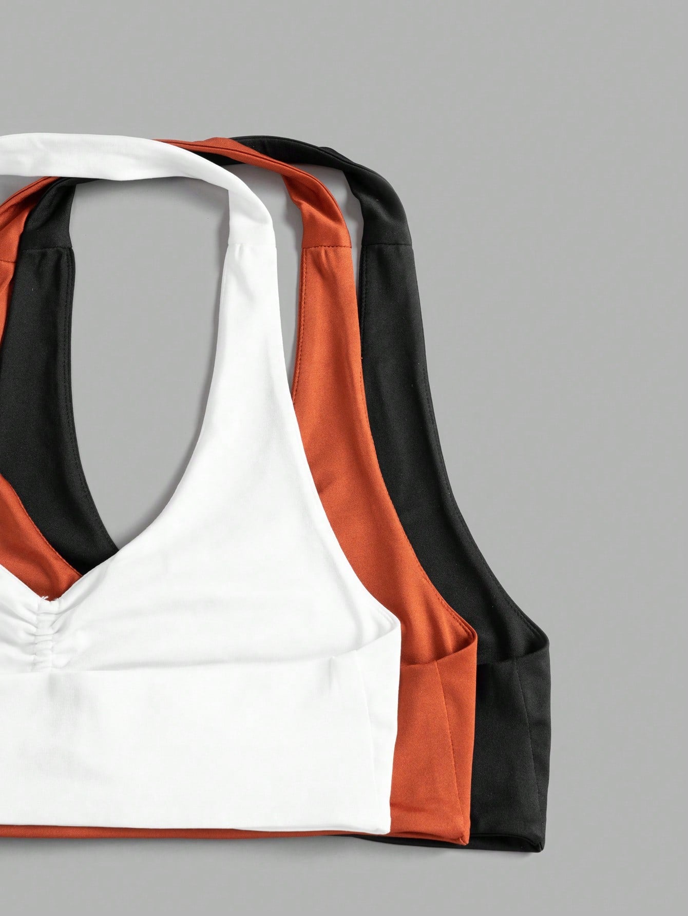 Elevate Your Workout with the Studio Sport 3-Piece Letter Graphic Backless Sports Tee Set