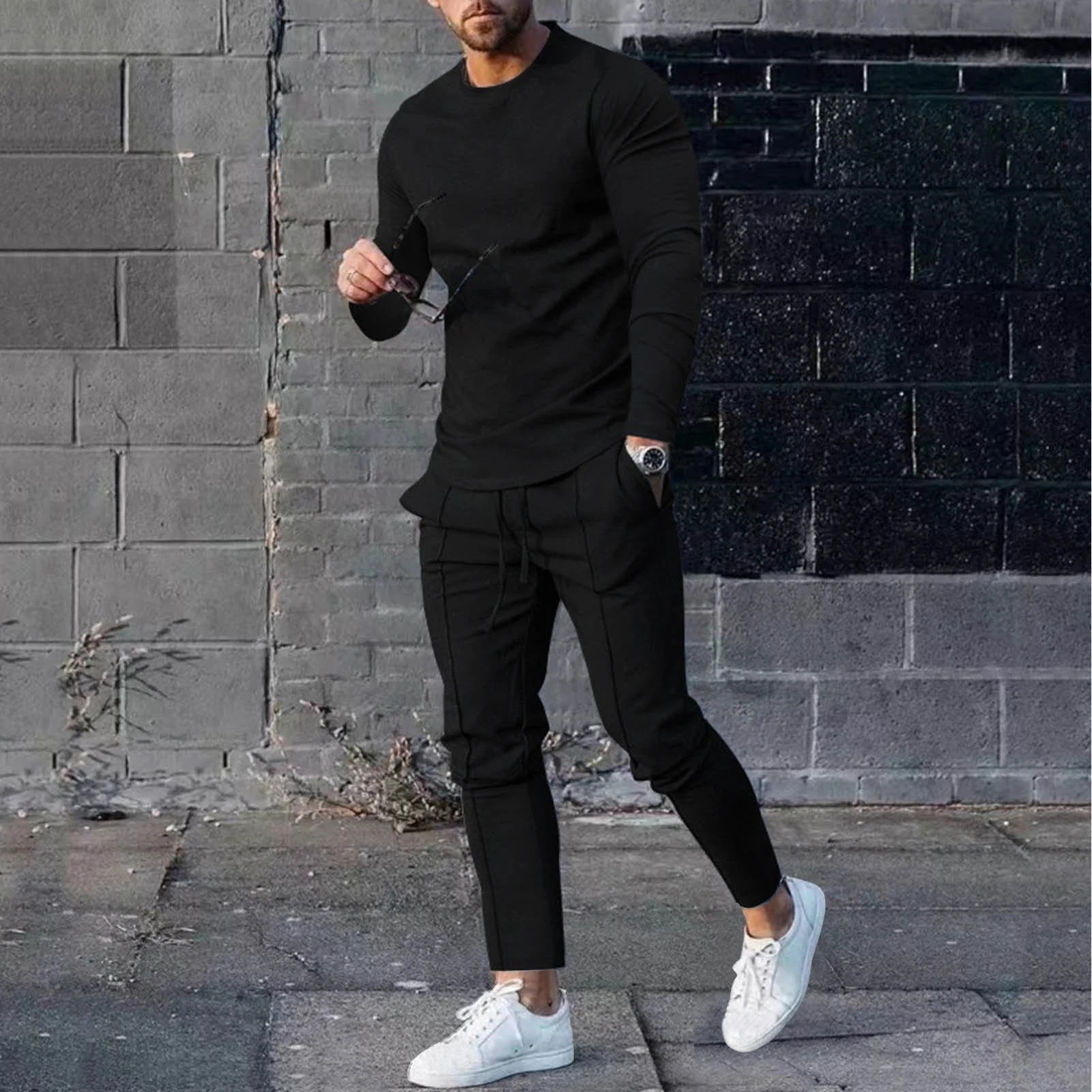 Men's black casual sports sweatsuits two-piece set with tight fit T-shirt and pants for fitness and training